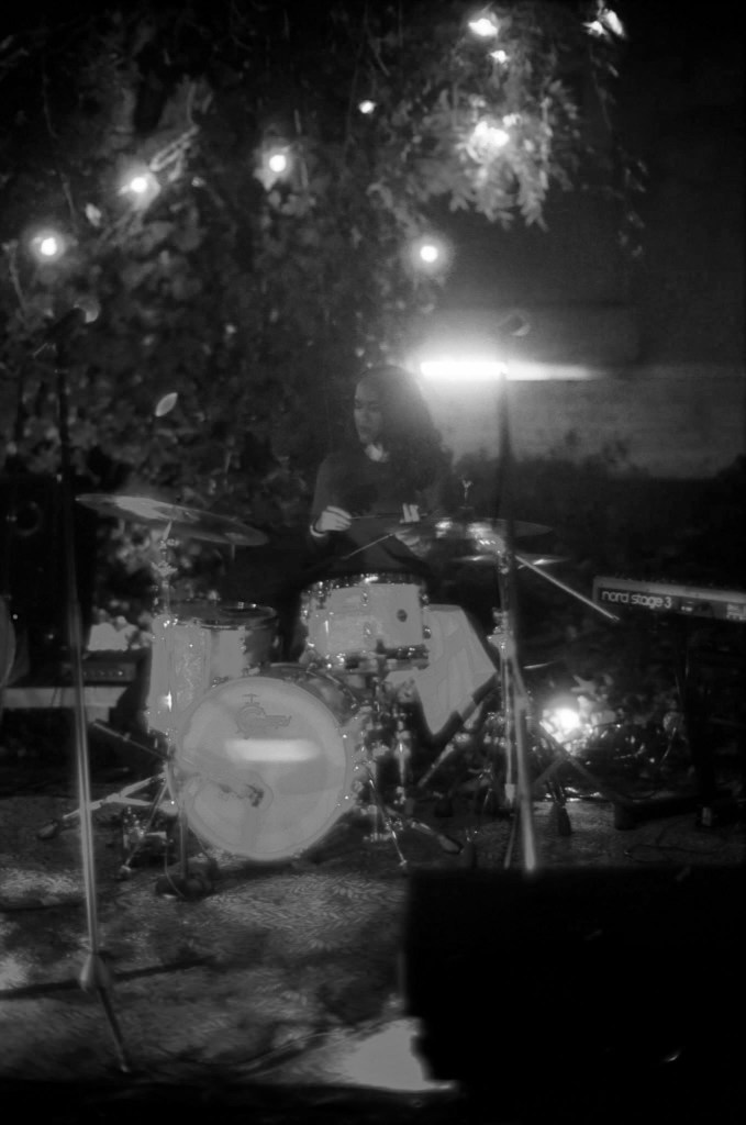 female drummer woman drumming indie artist music therapist mt-bc